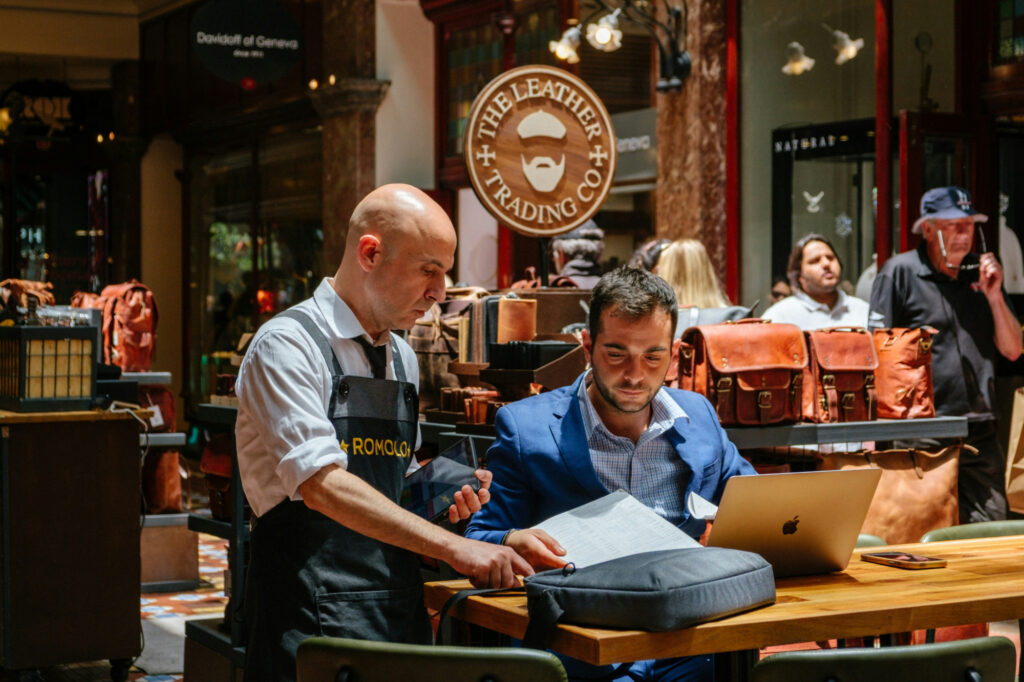 Small business owner meeting with advisor to develop a business exit strategy.